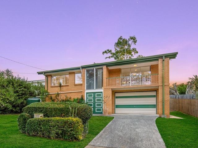 Elevated Family Living with Endless Potential on a Generous Allotment