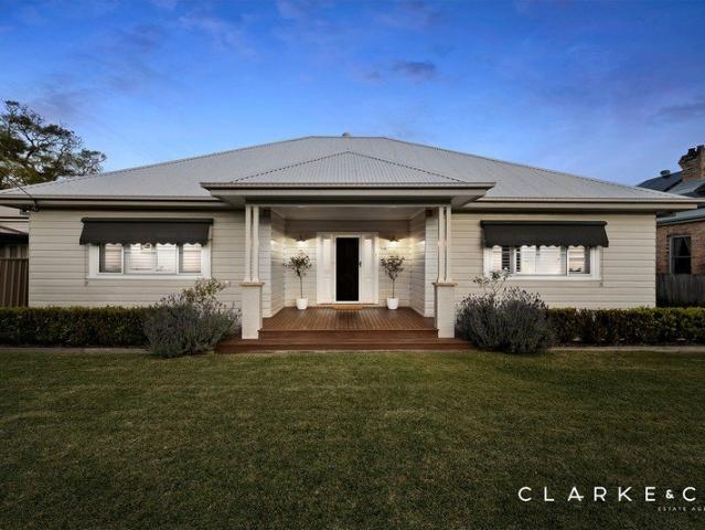 ELEVATED FAMILY LIVING WITH EXCEPTIONAL OUTDOOR APPEAL!
