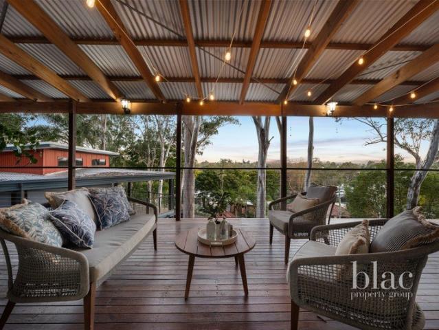 Elevated Family Living with Expansive Deck, Views & Pool