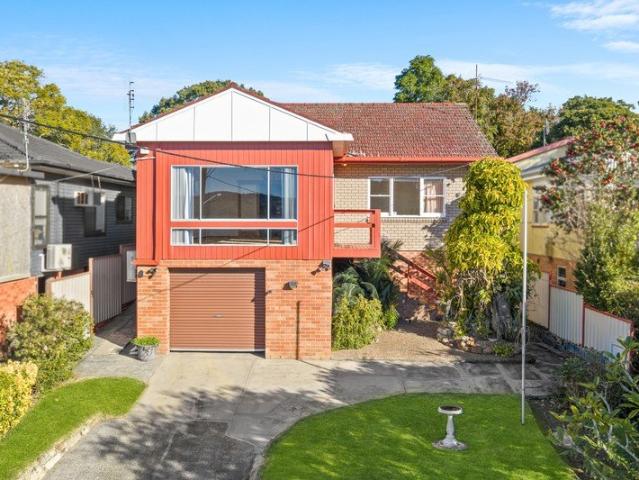 Elevated Family Living with Future Development Potential