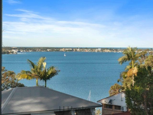 Elevated Family Living with Lake Views & Timeless Character