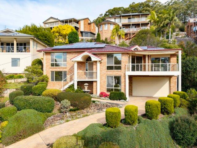 Elevated Family Living with Lake Views & Flexible Dual Level Design