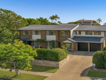 Elevated Family Living with Multiple Living Zones & Versatile Lower Level