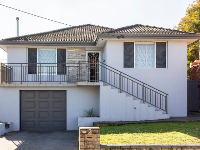 ELEVATED FAMILY LIVING WITH NORTH FACING REAR