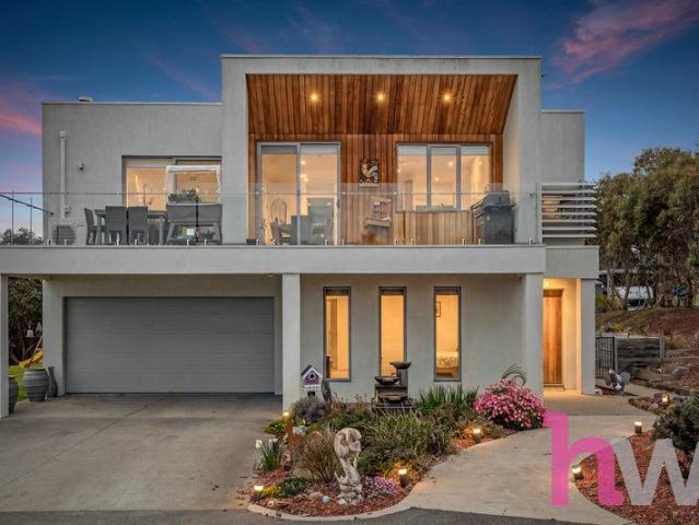 Elevated Family Living with Spectacular Bay Views on Four Acres