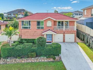 ELEVATED FAMILY LIVING WITH STUNNING GARDENS, SOLAR EFFICIENCY & VERSATILE SPACES!