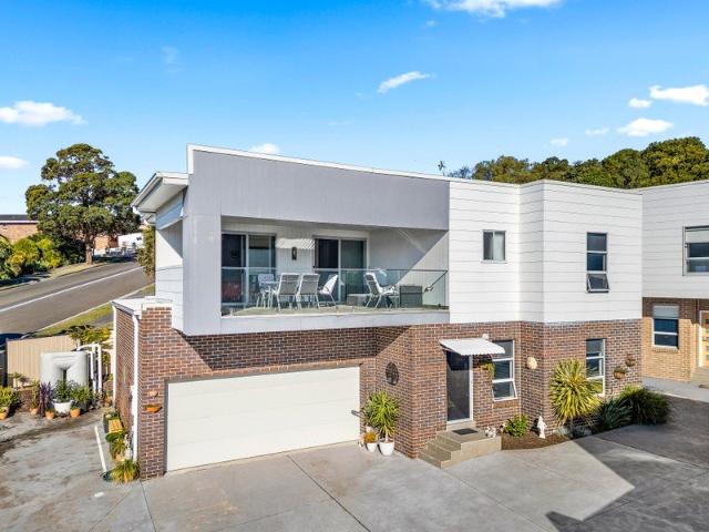 Torrens title Elevated Family Living with Stunning Lake Views