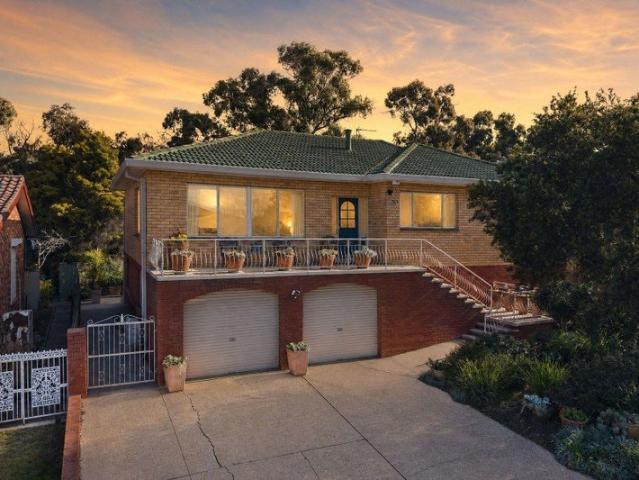 Elevated Family Living with Stunning Views & Flexible Dual Level Design