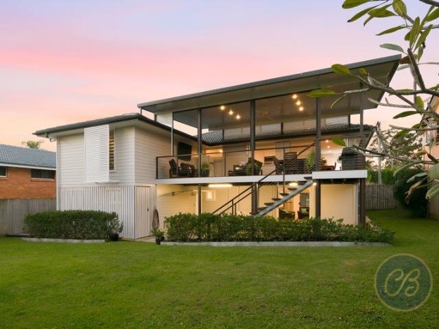 Elevated Family Living with Sunset Deck Entertaining