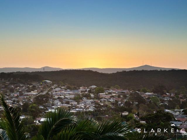 ELEVATED FAMILY LIVING WITH SWEEPING VIEWS!
