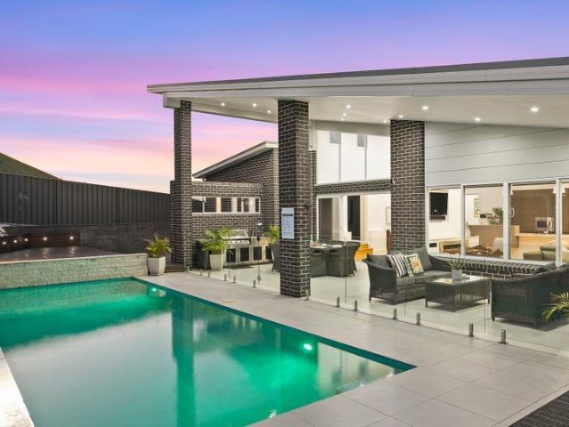 Elevated Family Living with Panoramic Lake & Coastal Views