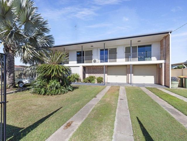 ELEVATED FAMILY LIVING WITH ROOM TO MOVE 5 BEDROOMS, HUGE YARD & AMPLE PARKING