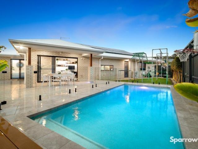 ELEVATED FAMILY LIVING WITH RESORT STYLE ENTERTAINING, STUNNING VIEWS & PREMIUM EXTRAS