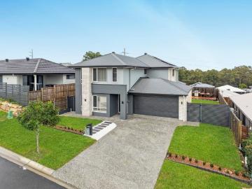 Elevated Family Living with Unrivalled Views One of Logan Reserve's Finest Homes BY PRIVATE INSPECTION ONLY