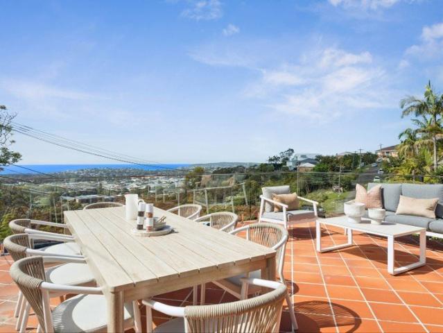Elevated family sanctuary with sweeping ocean views
