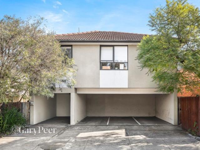 Elevated first floor living in a prime lifestyle location