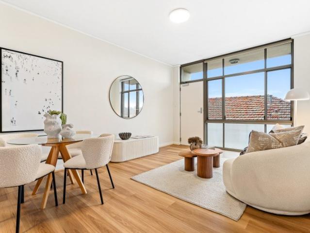 Elevated Ground Floor Apartment with North Facing Courtyard and Unmatched Convenience