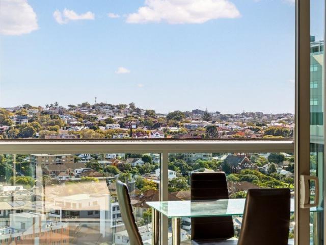 Elevated Hamilton Lifestyle with Breathtaking Hillside Views + Storage Cage!