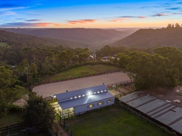 Elevated Headland Position 240 Degree Bushland Views and Exceptional Income Potential