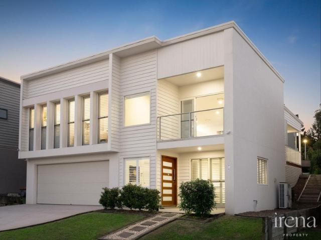 Elevated Home in Exclusive Gated Community with Pool Access