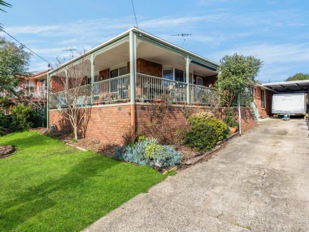 Elevated home in good pocket