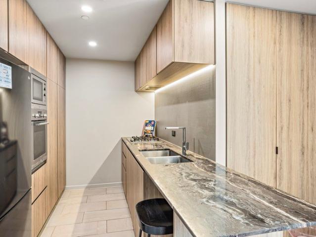 Elevated Inner City Living with Rooftop Entertaining & Iconic City Views