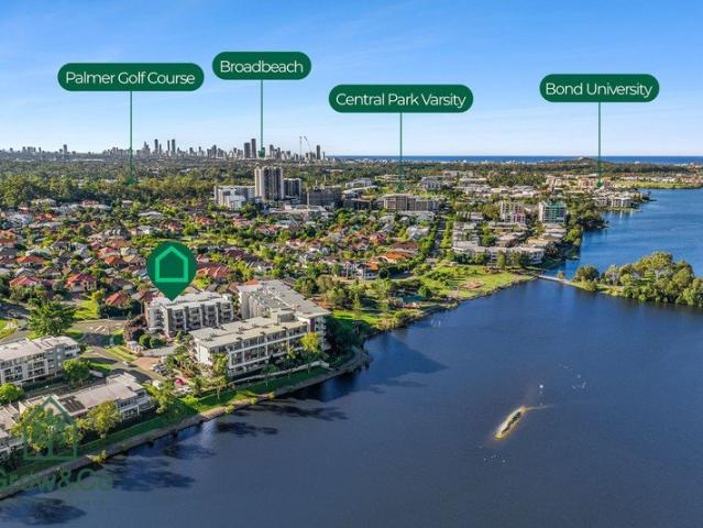 ELEVATED LAKESIDE LIVING WITH HIGH CEILINGS, STUNNING VIEWS & MUST SELL MOTIVATION