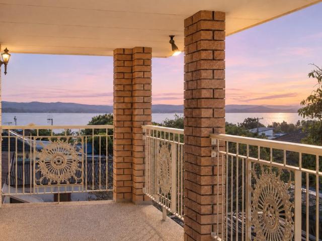 Elevated Lakeside Retreat with Space, Views & Convenience