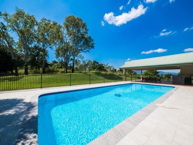 Elevated Living, Endless Space & Resort Style Entertaining