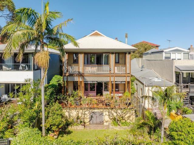 Elevated living, framed by Queens Park
