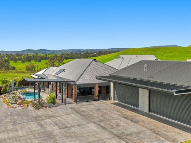 ELEVATED LIVING, HEATED POOL & THE ULTIMATE SHED