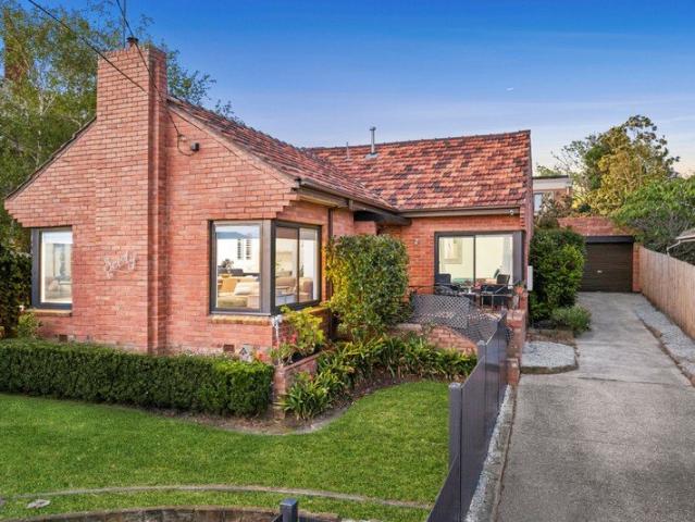 Elevated Living in a Coveted Newtown Streetscape