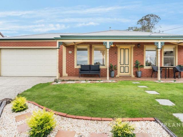 Elevated Living in an Exceptionally Convenient Location
