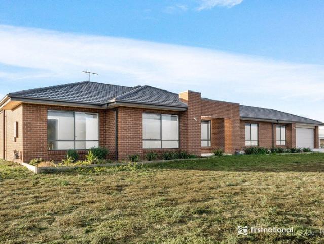 Elevated Living on Garonne Drive!