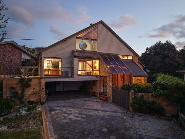 ELEVATED LIVING WITH AN ENVIABLE LOCATION