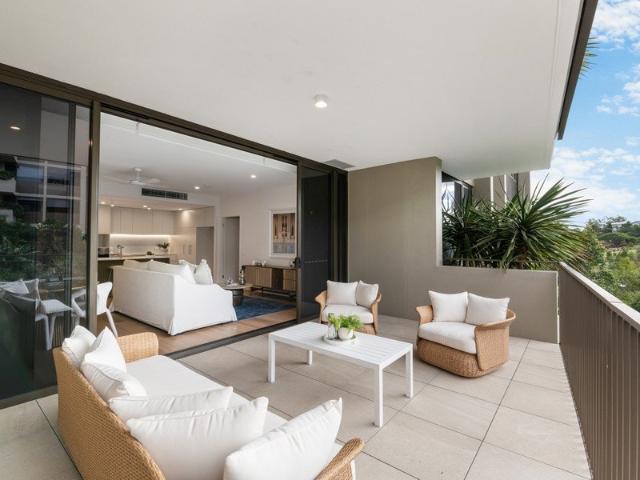 Elevated Living with Beautiful Garden and Lake Outlook