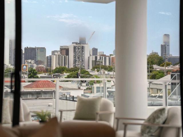 Elevated Living with Expansive Interiors & City Views