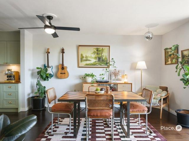 Elevated Living with Leafy Outlooks and City Views