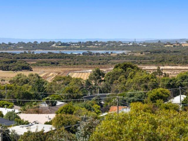 Elevated Living with Panoramic Coastal Outlooks!