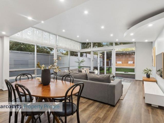 Elevated Living with Panoramic Views and Double Garage