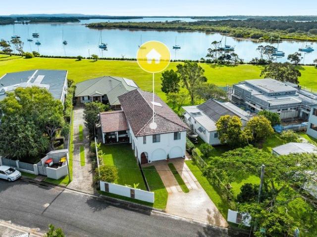 Elevated Living with River Views in a Quiet Yet Central Location
