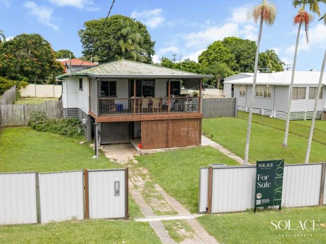 Elevated Living with Spacious Deck, Side Access & great yard space