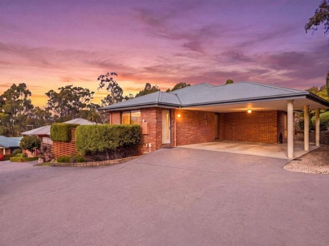 Elevated Living with Stunning Views A Rare Youngtown Gem