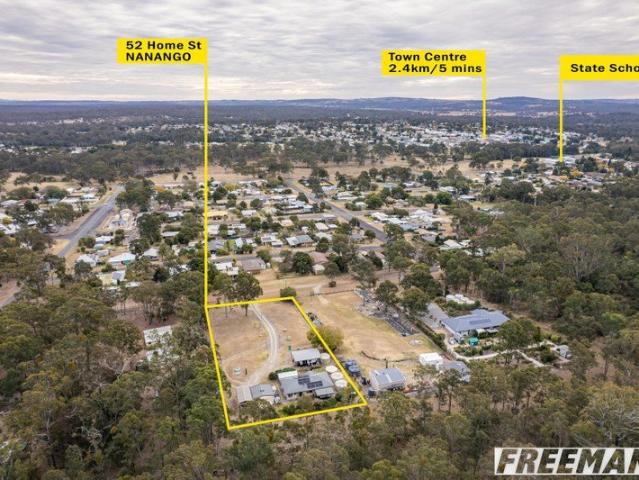 ELEVATED LOW SET BRICK HOME ON AN ACRE WITH GREAT VIEWS INTO TOWN!