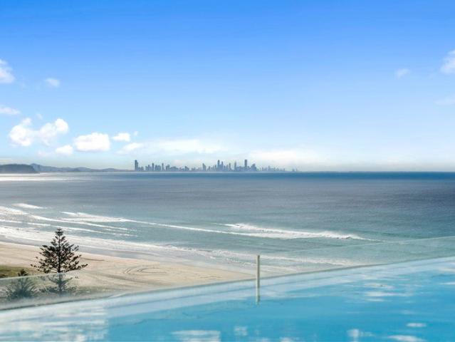 Luxury Top Floor Living Framed by Ocean, Sweeping Hinterland Views