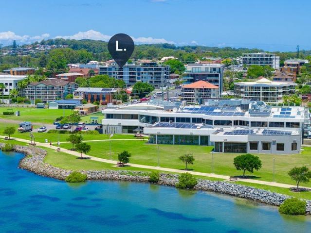 Elevated Luxury Living with Water Views & Private Rooftop Terrace