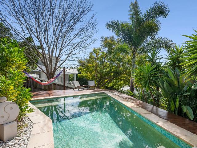 Elevated Multi Level Home in Tightly Held Enclave