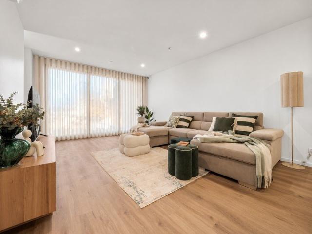 Elevated North East Corner Living with Suburban Views