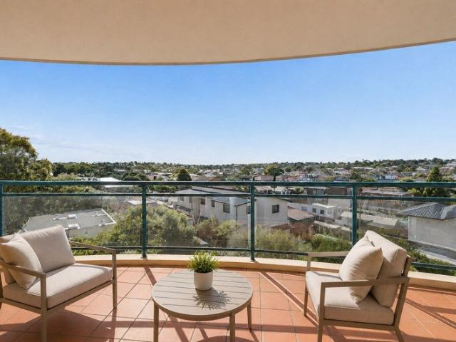 Elevated North Facing Apartment with City & Suburban Views