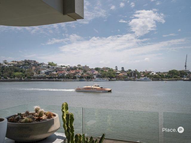 Elevated North Facing Riverfront Residence